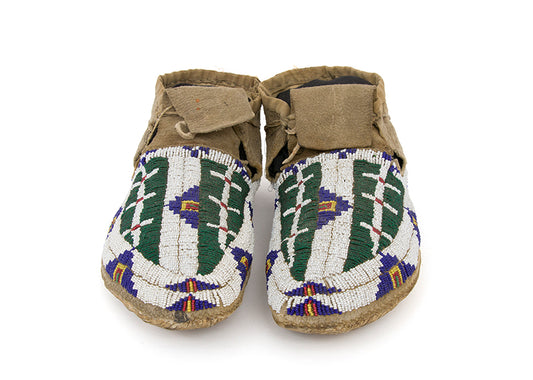 Beaded Moccasins with Buffalo Track and Tipi Motifs, circa 1880