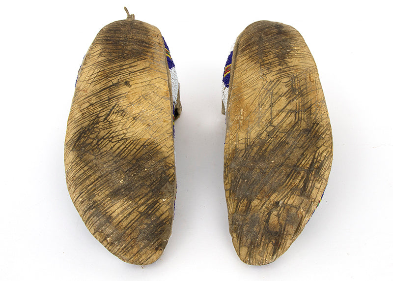 Beaded Moccasins with Buffalo Track and Tipi Motifs, circa 1880