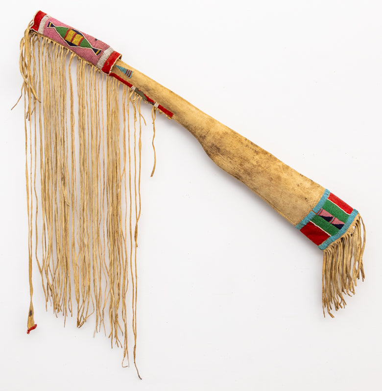 Classic Period Northern Plains Beaded Rifle Scabbard, Crow, circa 1865, glass trade beads and trade cloth on hide Rifle Scabbard