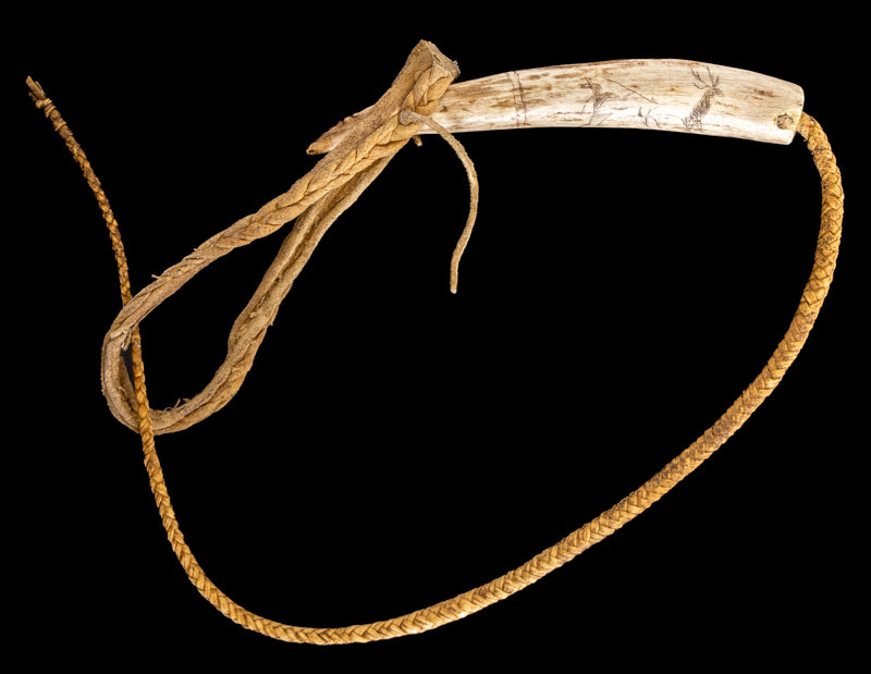 Southern Plains Quirt with Pictorial Carved Antler Handle, 19th century, Plains, antler on hide Quirt